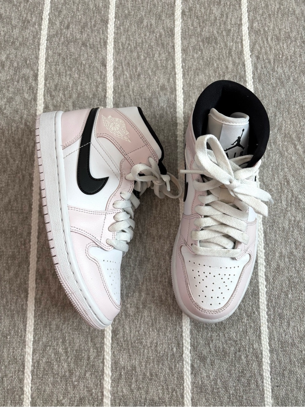 Nike Air Jordan 1 Mid Sneakers in Barely Rose